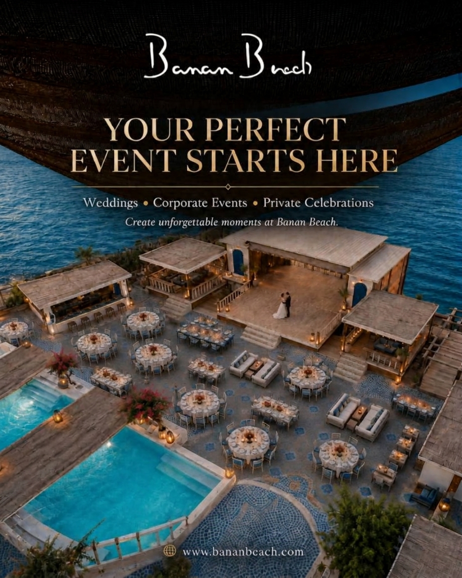 Aerial Banan Beach event setting with dining tables beside the water