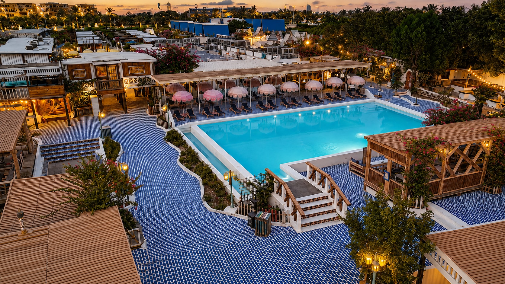 Aerial view of the main pool at dusk